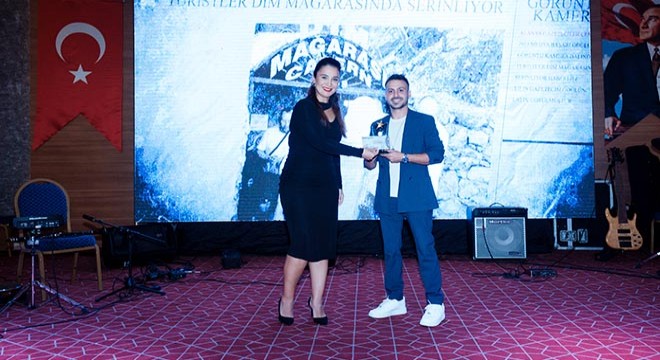 AGC'den DHA muhabirine ödül