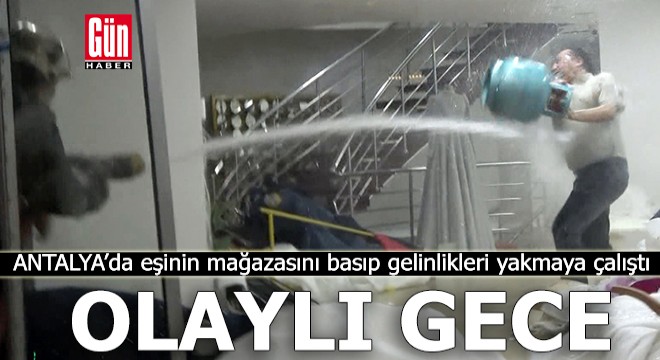 Antalya'da eşinin mağazasını basıp gelinlikleri yakmaya çalıştı