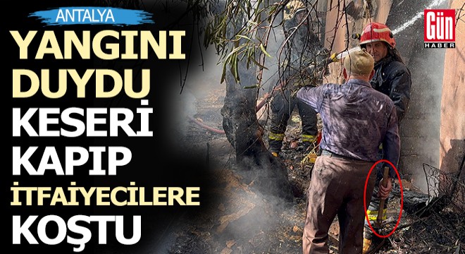 Ev sahibi, elindeki keserle itfaiyecilere yardıma koştu