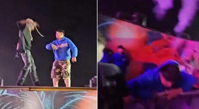 Konserde skandal: Hayranını aşağı itti