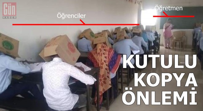 Kopya çekmesinler diye kafalarına kutu geçirdiler