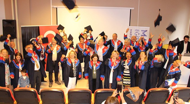 MAKÜ'de eski mezunlar biniş giydi