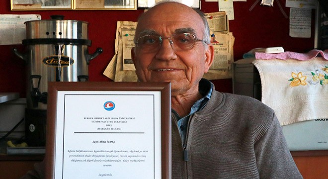 MAKÜ'den Ahmet İldeş'e plaket
