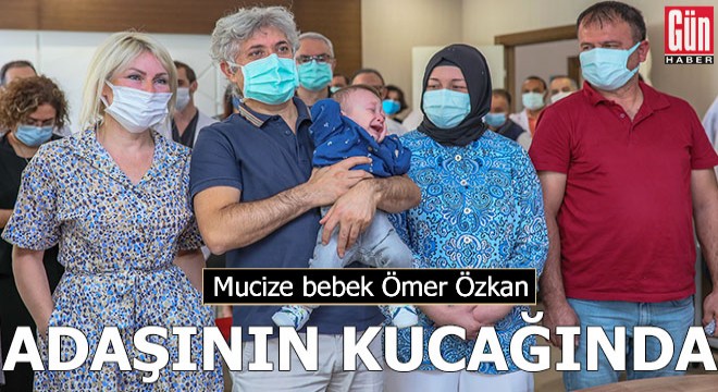 Mucize bebek, adaşı Ömer Özkan'ın kucağında