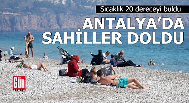 Sıcaklık 20 dereceyi buldu, Antalya'da sahiller doldu