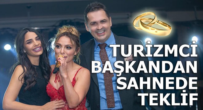 Turizmci başkan sahnede teklif etti 'Evet'i aldı