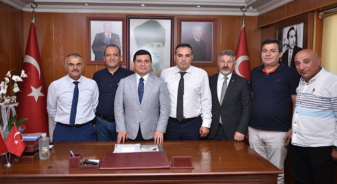 Tütüncü'den MHP'ye hayırlı olsun ziyareti